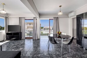 Apartment, 2 Bedrooms, Sea View | Living area | 32-inch flat-screen TV with digital channels, TV - Seaside Secret by BluPine (Vari-Voula-Vouliagmeni)