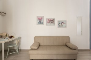 Studiosuite – superior, byutsikt (Rose) | Oppholdsrom | Flatskjerm-TV