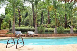 Outdoor pool, open 6:30 AM to 6:30 PM, sun loungers