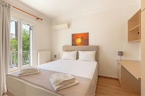 Apartment, 1 Bedroom, City View | Individually decorated, individually furnished, iron/ironing board