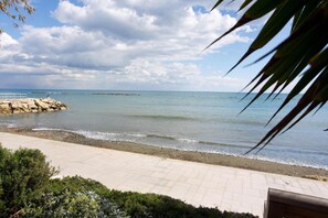 On the beach, sun-loungers, beach umbrellas, beach towels - Opera Studio with Pool by TrulyCyprus (Limassol)