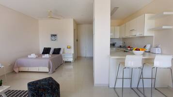 Deluxe Suite, Pool View | Individually decorated, individually furnished, blackout curtains