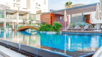 Outdoor pool, pool umbrellas, pool loungers