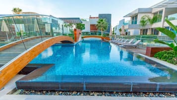 Outdoor pool, pool umbrellas, pool loungers