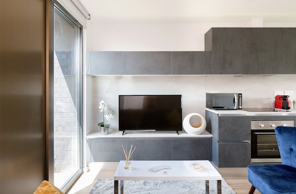 Appartement, plusieurs lits | Coin séjour