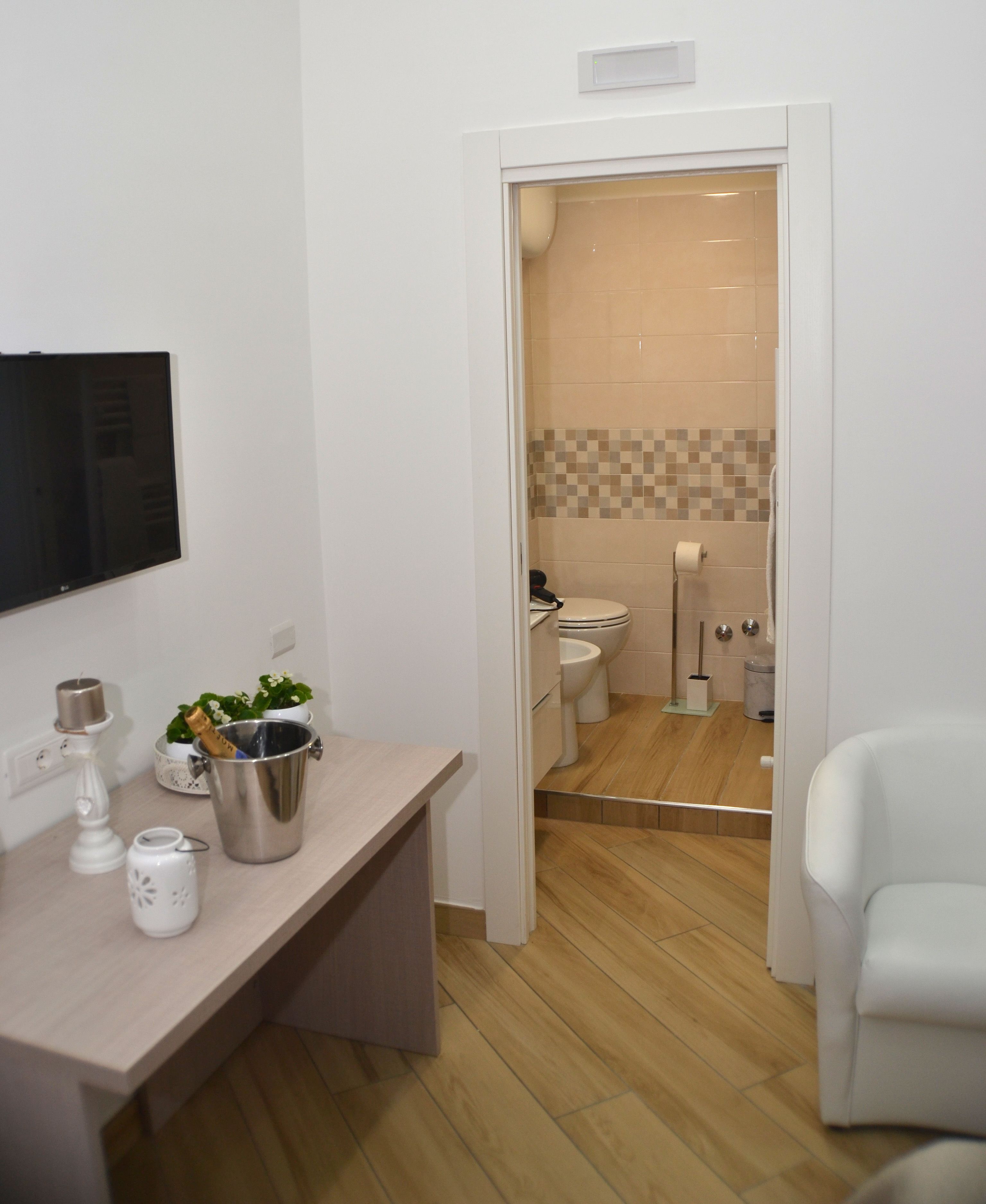 Deluxe Quadruple Room, City View | Premium bedding, down duvets, blackout curtains, soundproofing