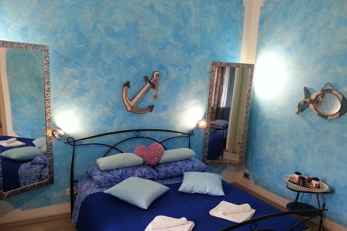 Standard Quadruple Room | 1 bedroom, desk, bed sheets
