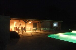 Seasonal outdoor pool, open 10:30 AM to 7:00 PM, pool umbrellas