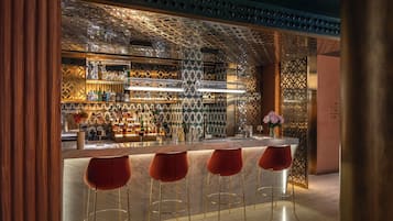 Rooftop bar, pool views, open daily