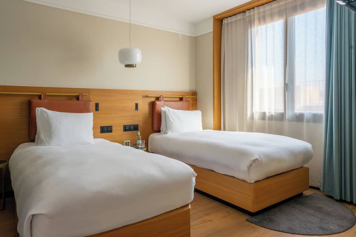 Egyptian cotton sheets, premium bedding, down duvets, minibar