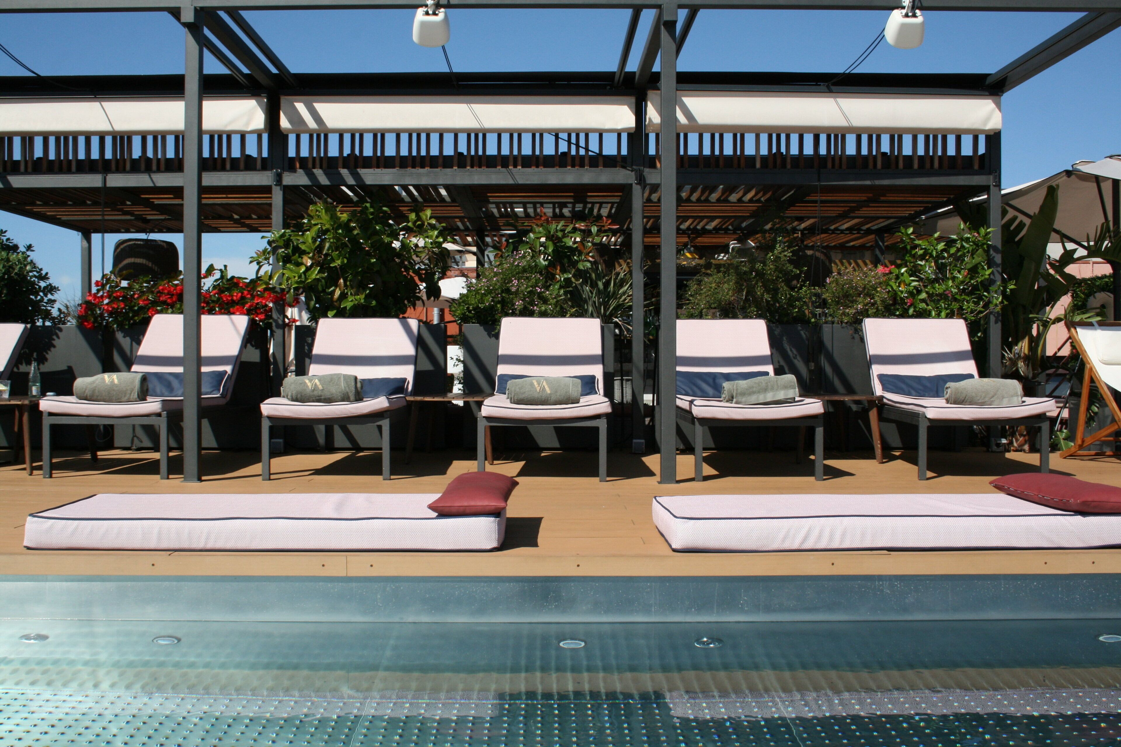 Seasonal outdoor pool, pool umbrellas, pool loungers