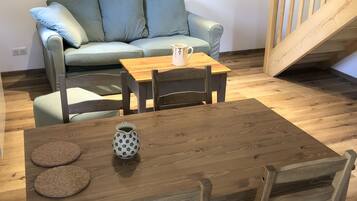 Comfort appartement | Woonkamer | Flatscreentelevisie