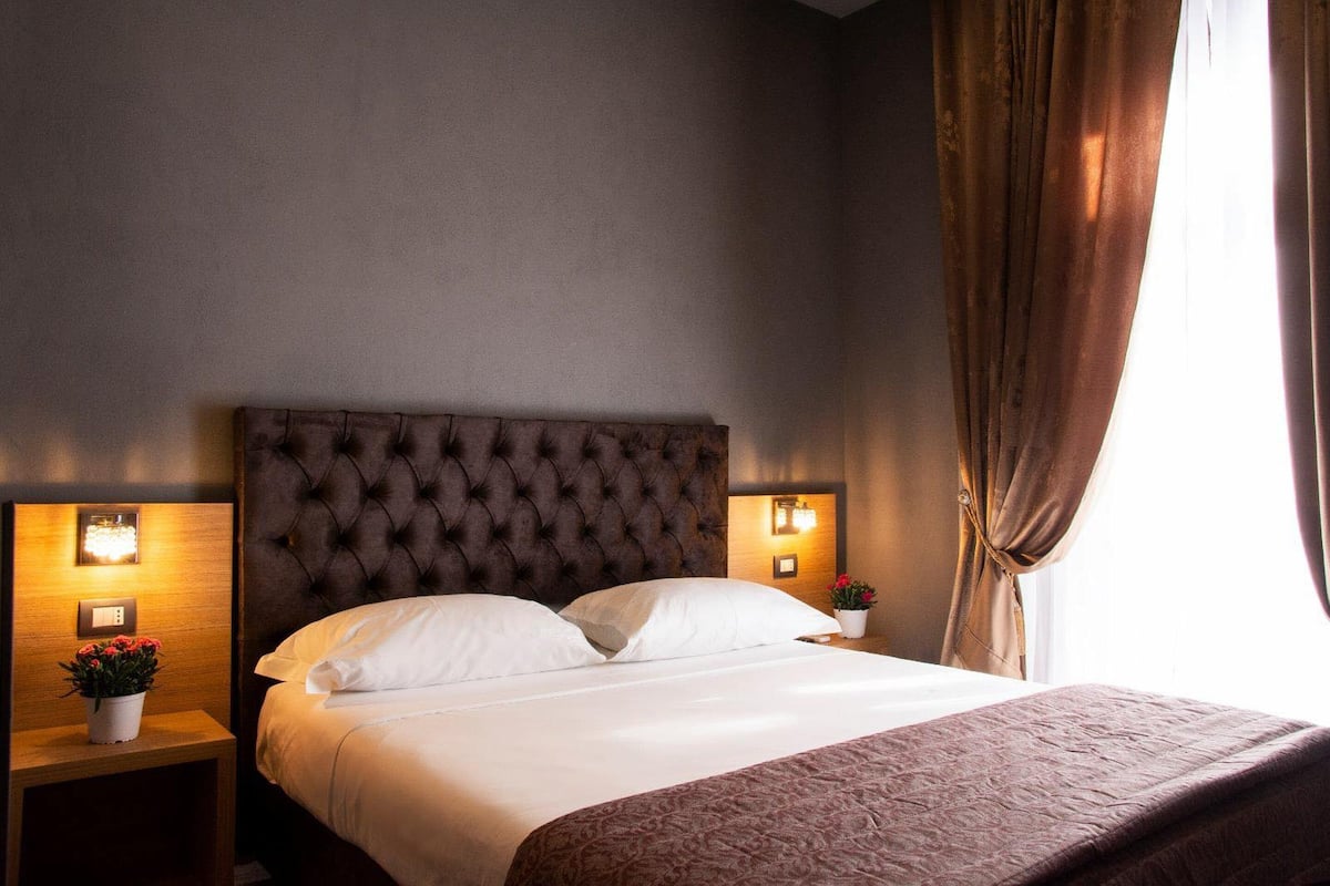 Standard Room, 1 Queen Bed, City View | 1 bedroom, premium bedding, desk, blackout drapes