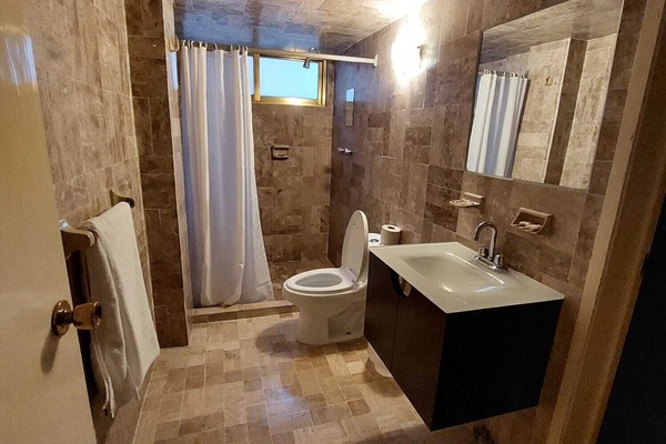 Standard Suite, City View | Bathroom | Shower, hair dryer, towels, soap