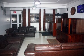 Family Apartment | Living area | Flat-screen TV