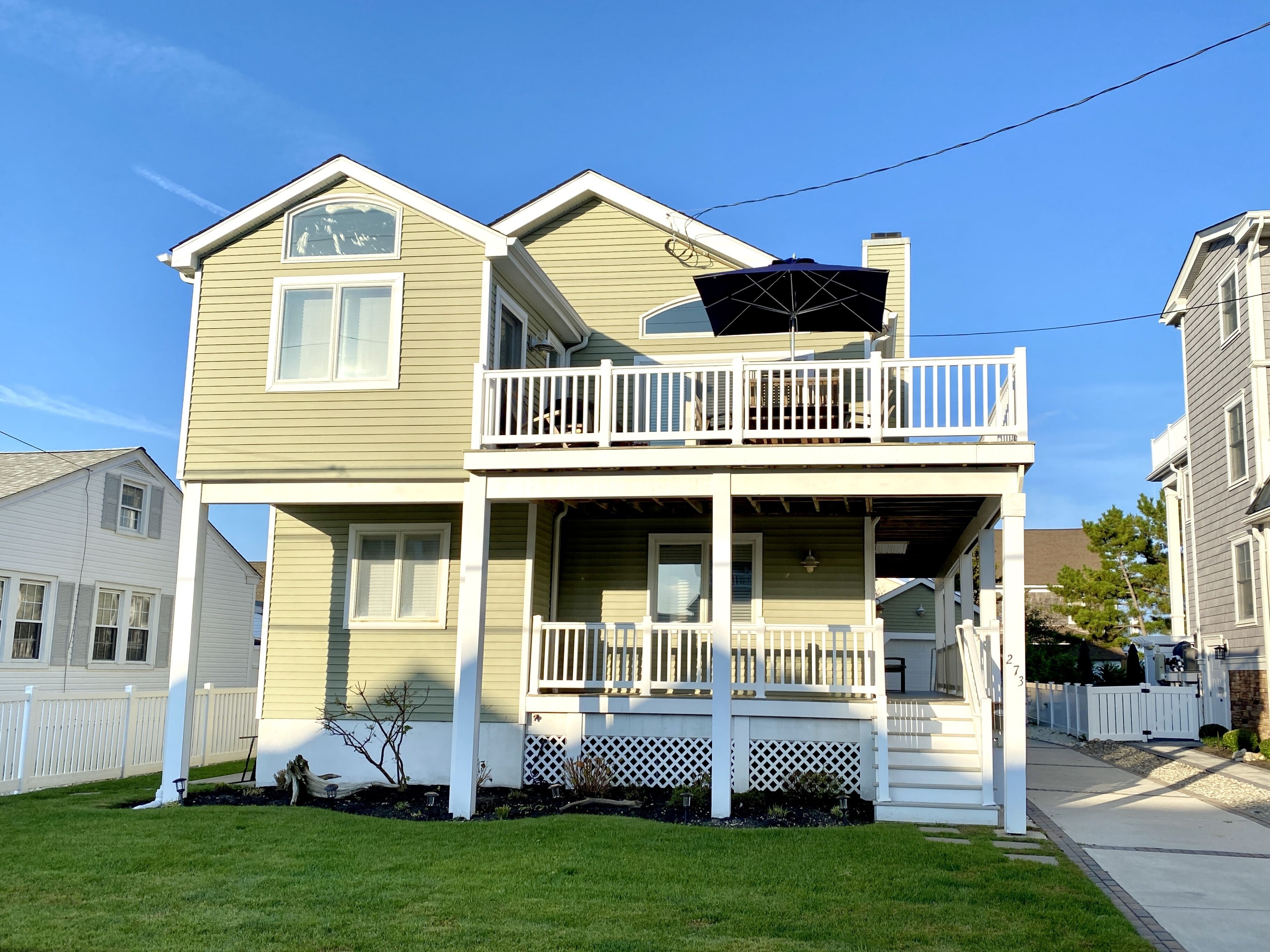 Heated Swimming Pool, first floor family room with sliders to rear yard and large,