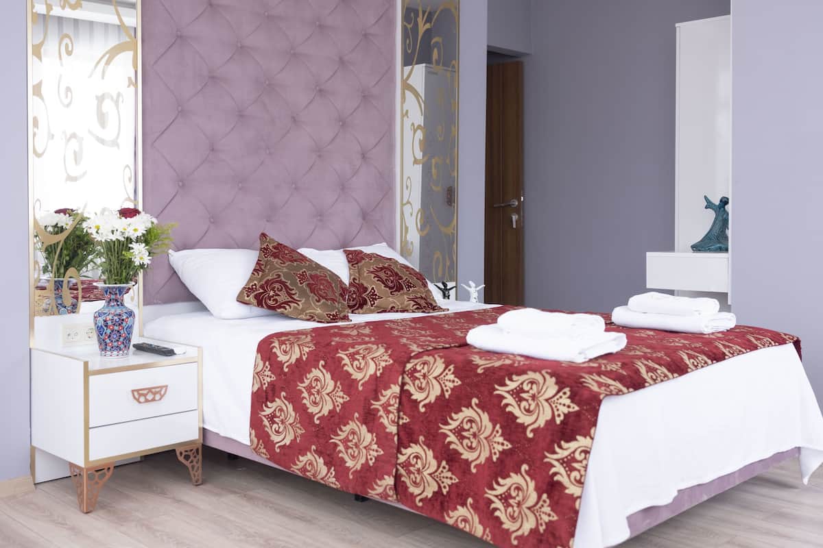 Chambre Double Deluxe, vue mer | Minibar, coffres-forts dans les chambres, décoration personnalisée