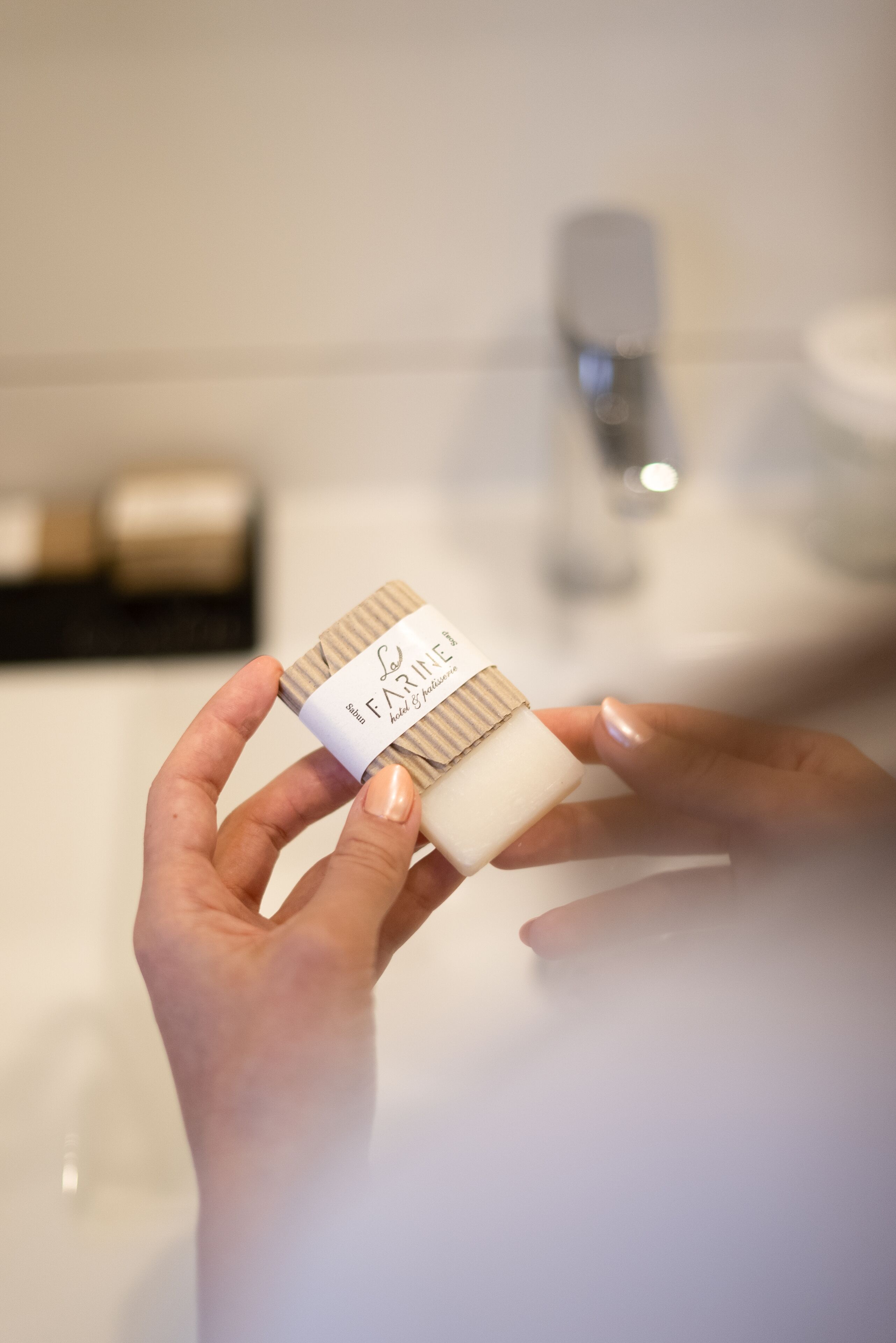 deluxe suite, sea view | bathroom | hair dryer, slippers, towels, soap