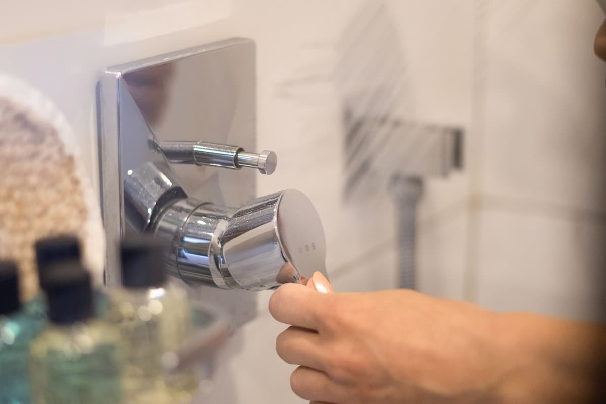 hair dryer, slippers, towels, soap