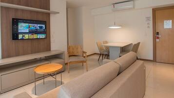 Apartment, 2 Bedrooms | Living area | 32-inch TV with cable channels