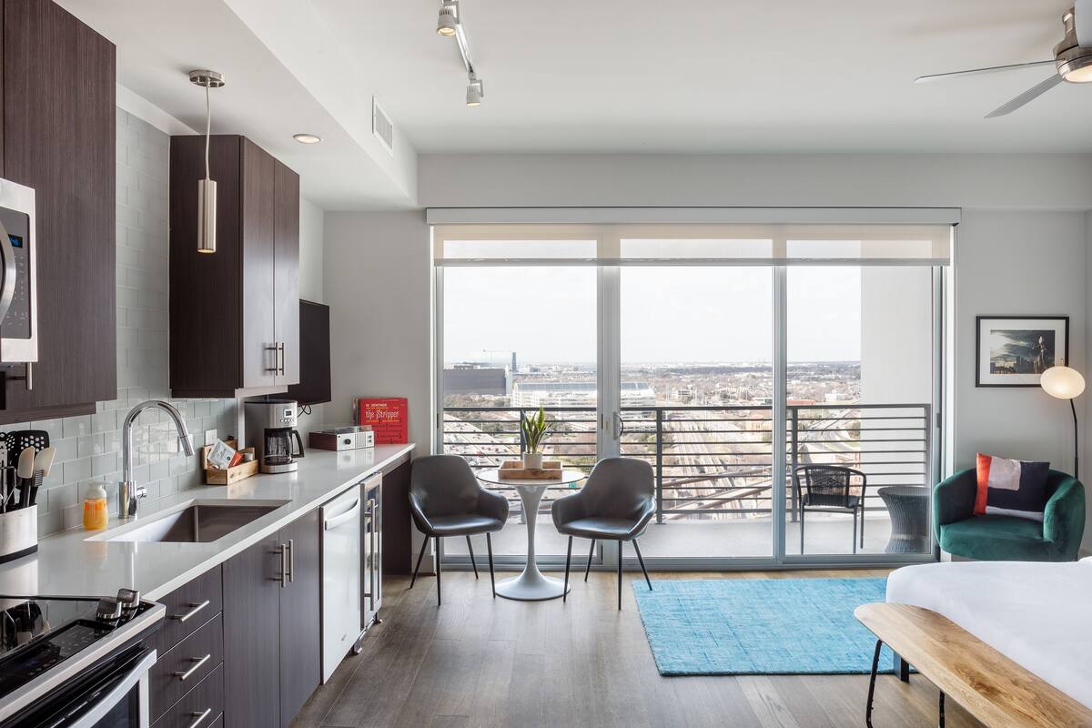 Studio Apartment | Premium bedding, laptop workspace, blackout drapes, soundproofing