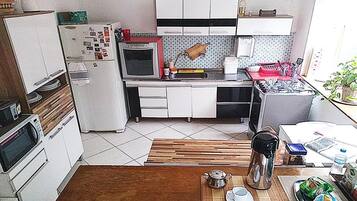Fridge, microwave, cookware/dishes/utensils