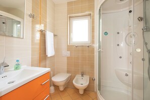Hair dryer, towels, soap, toilet paper