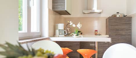 Fridge, coffee/tea maker, electric kettle, toaster