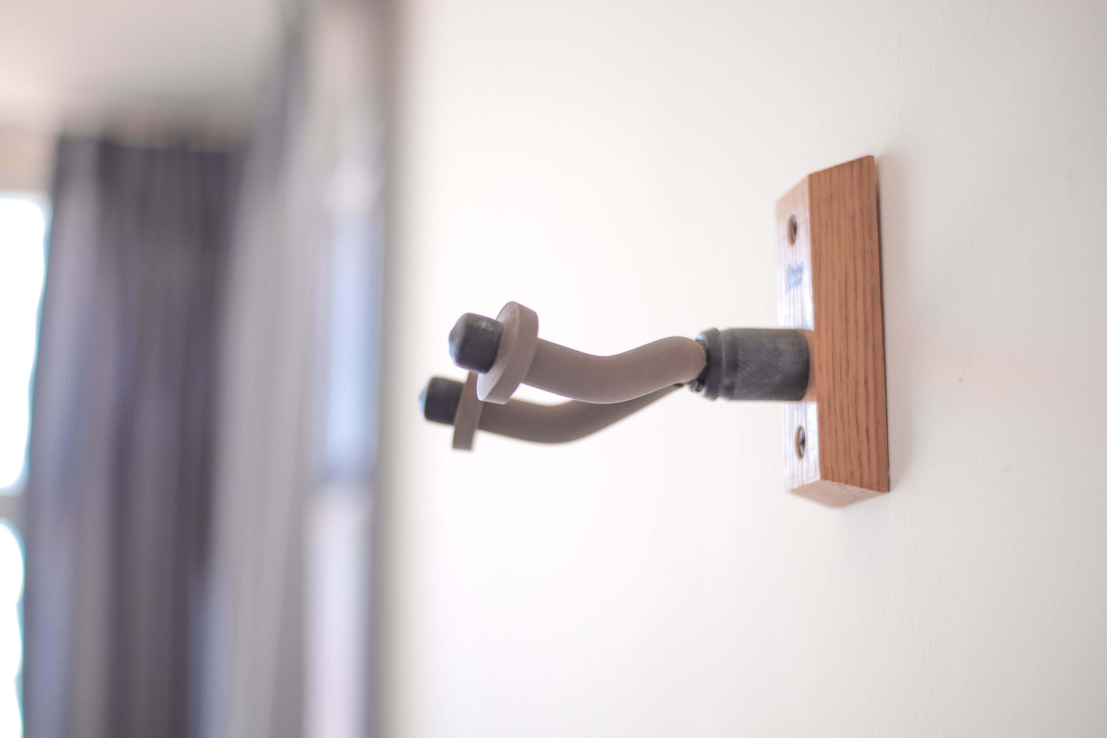 A wall-mounted pipe fixture.