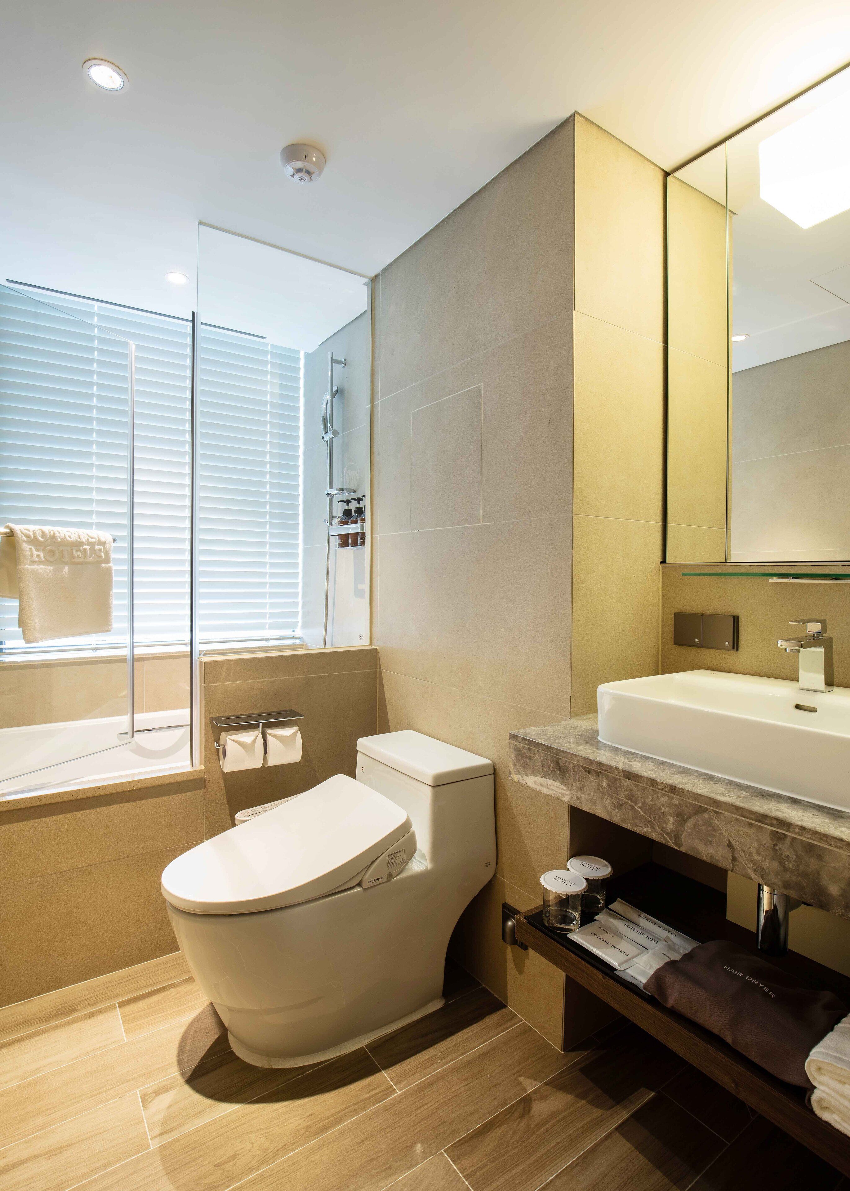 free toiletries, hair dryer, slippers, electronic bidet