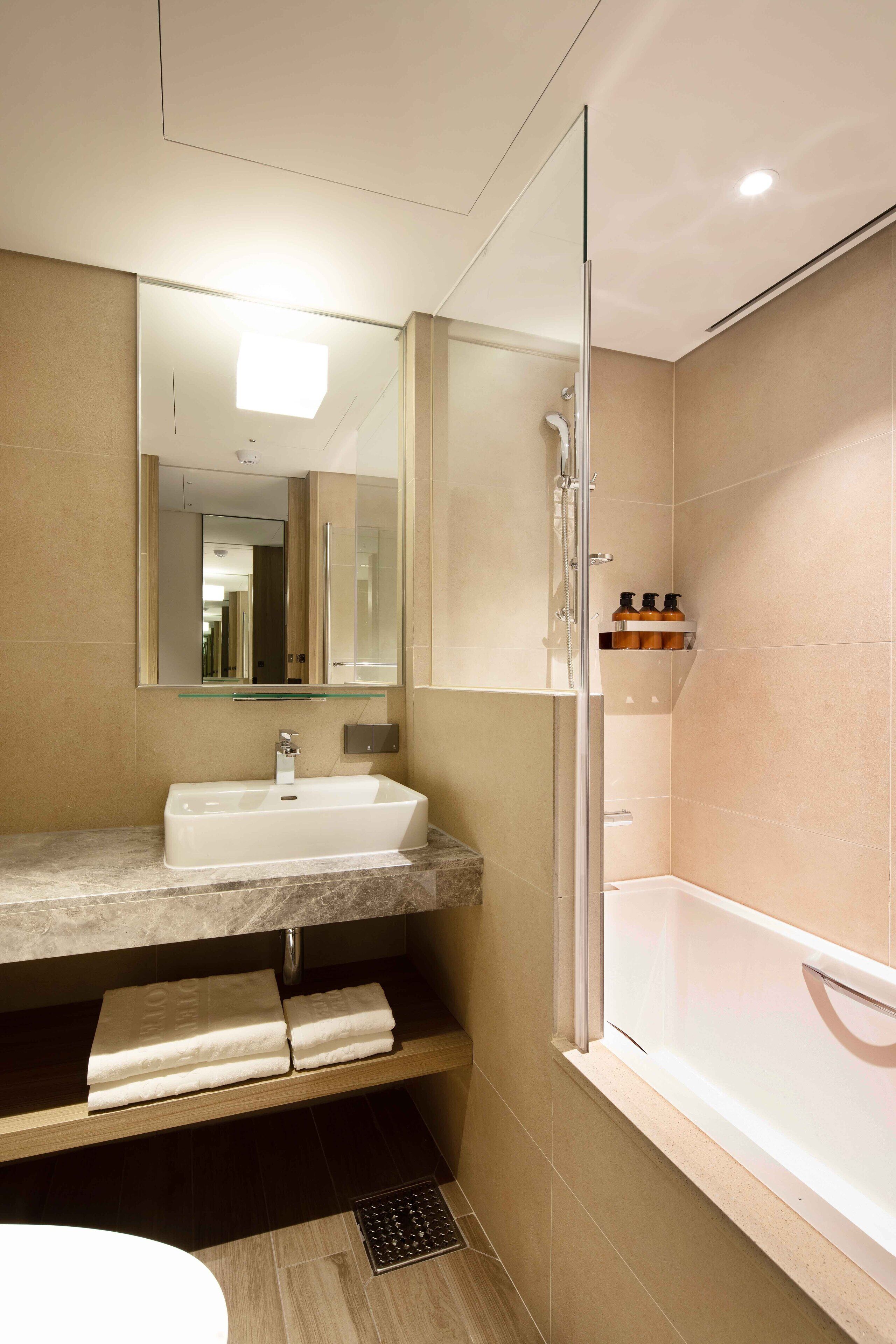 standard twin room (credit cards only) | bathroom | free toiletries, hair dryer, slippers, electronic bidet