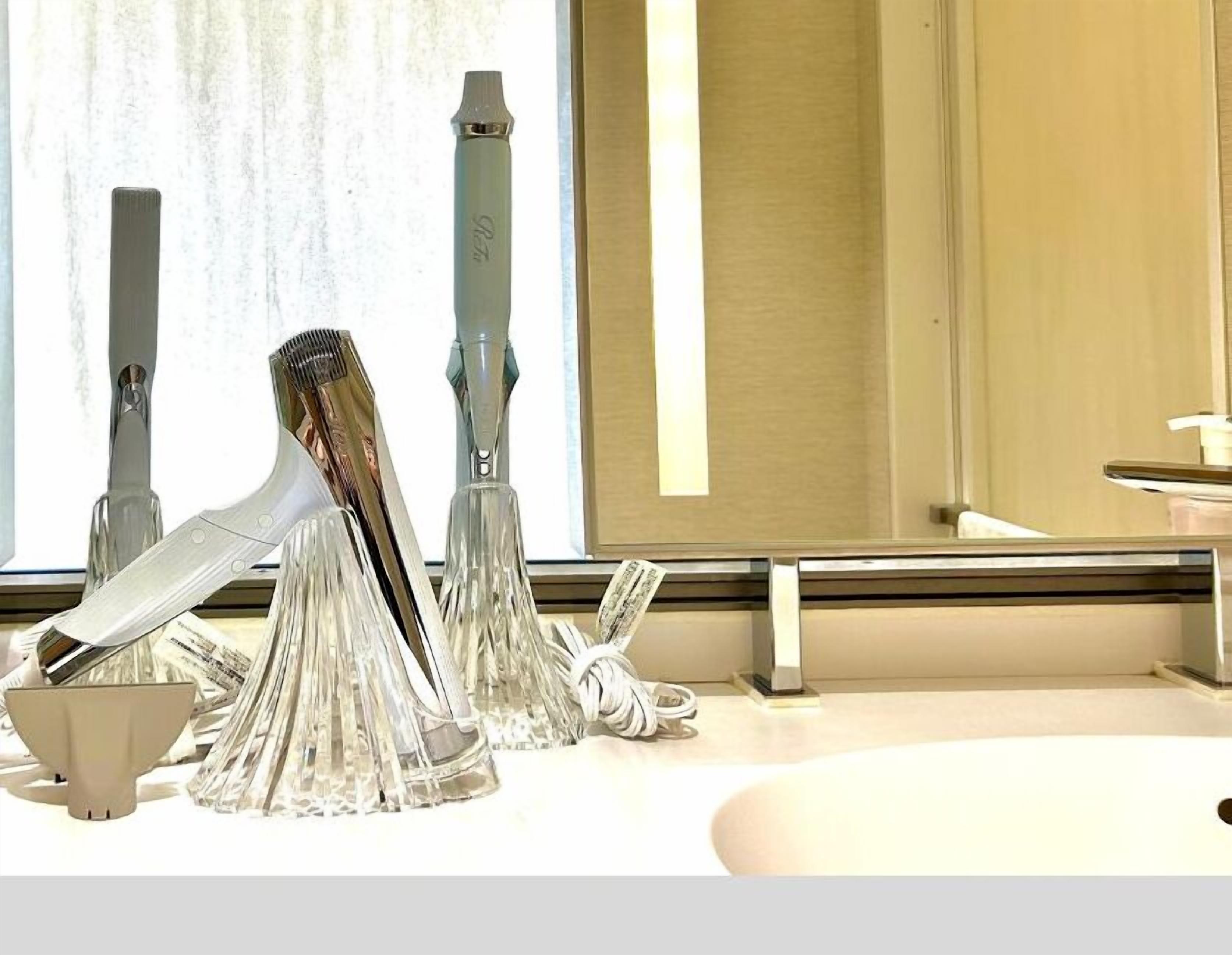 separate bathtub and shower, free toiletries, hair dryer, slippers