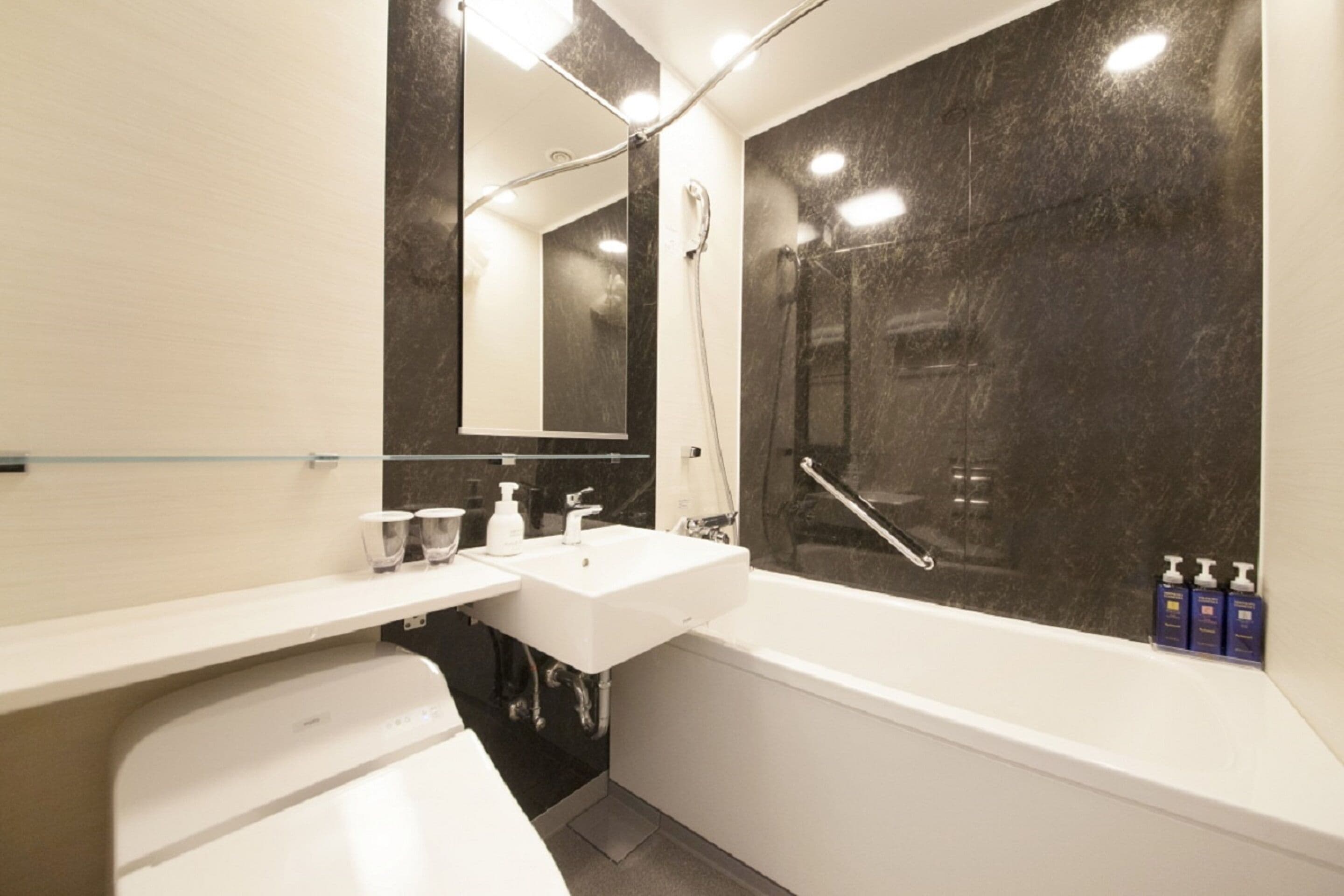 separate bathtub and shower, free toiletries, hair dryer, slippers