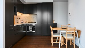 Deluxe Apartment, 2 Bedrooms, City View | In-room dining