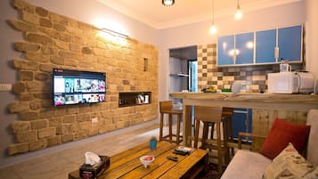 Apartment 1  | Living room | 42-inch Smart TV with satellite channels, TV, Netflix