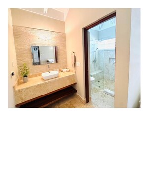 Bathtub, hair dryer, towels, soap