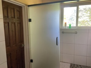 Shower, towels, soap, toilet paper