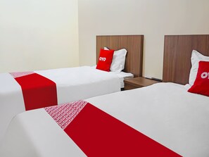 Habitación individual Deluxe | Wifi gratis y ropa de cama 
