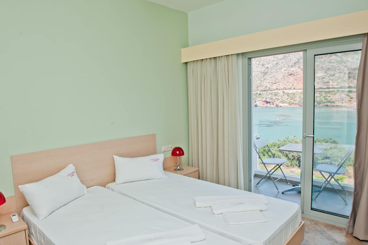 Standaard kamer, 1 twee- of 2 eenpersoonsbedden | Een bureau, gratis wifi, beddengoed