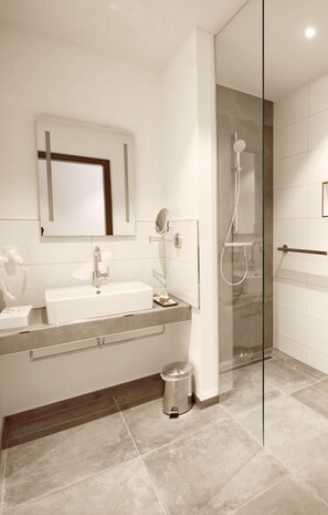 Shower, free toiletries, hair dryer, slippers