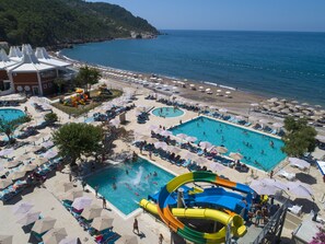 Seasonal outdoor pool, pool umbrellas, pool loungers