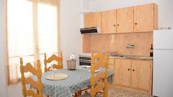 Fridge, stovetop, cookware/dishes/utensils