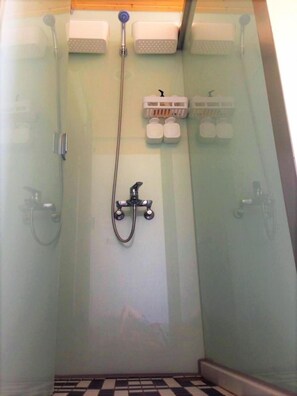 Shower, hair dryer, soap, shampoo