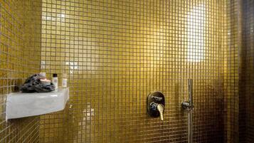 Suite, Hot Tub, Sea View | Bathroom | Shower, rainfall showerhead, free toiletries, hair dryer