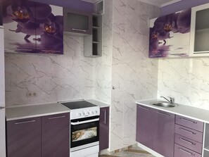 Fridge, electric kettle, cookware/dishes/utensils