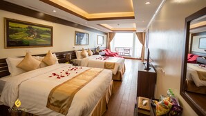 Family Quadruple Room, Mountain View | Minibar, in-room safe, desk, laptop workspace - Golden View Sapa Hotel (Sa Pa)