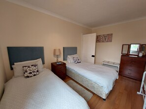 4 bedrooms, desk, iron/ironing board, travel cot