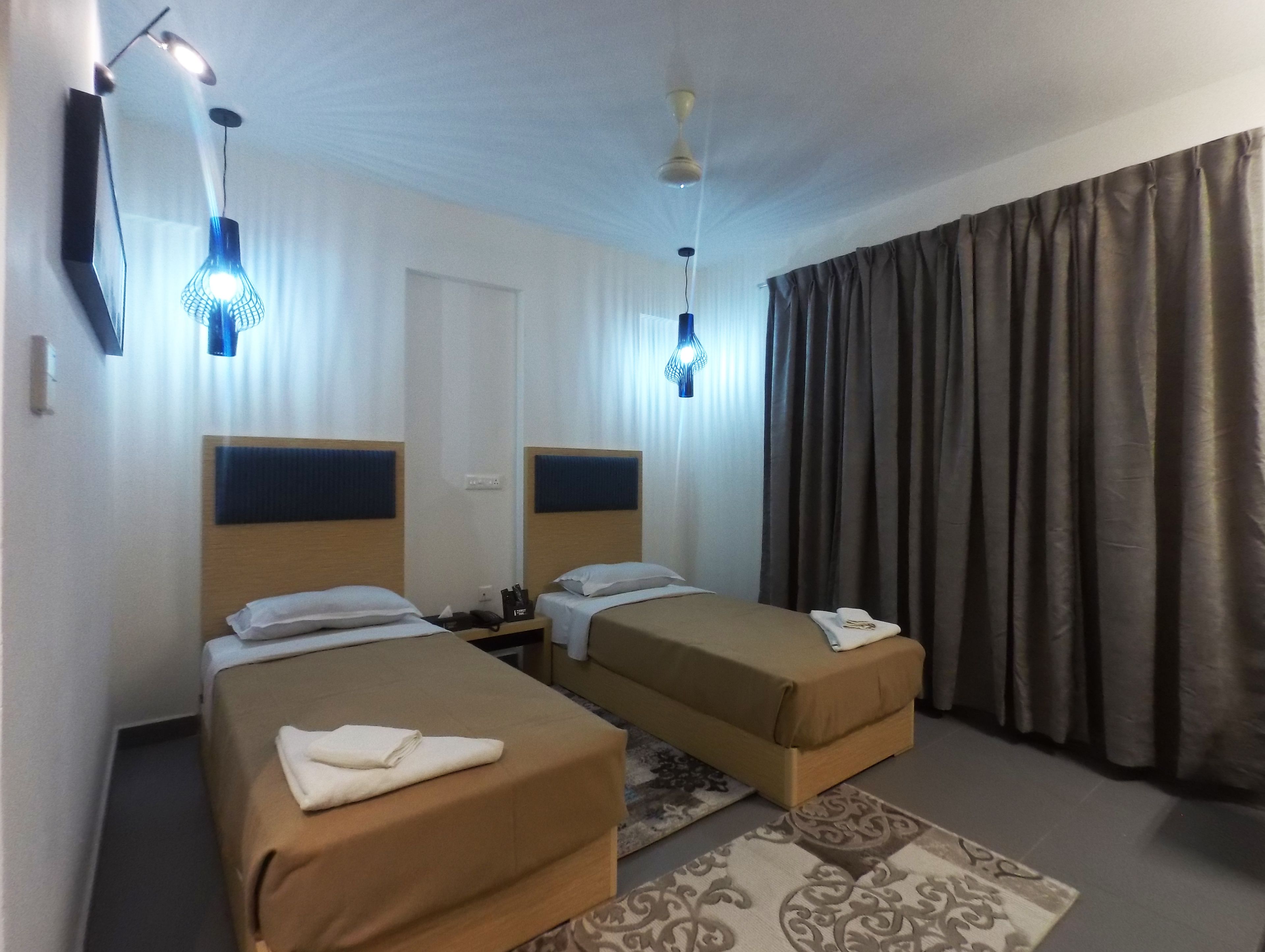Deluxe Twin Room, City View | In-room safe, desk, soundproofing, free WiFi