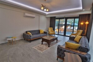 Villa, 4 chambres | Coin séjour