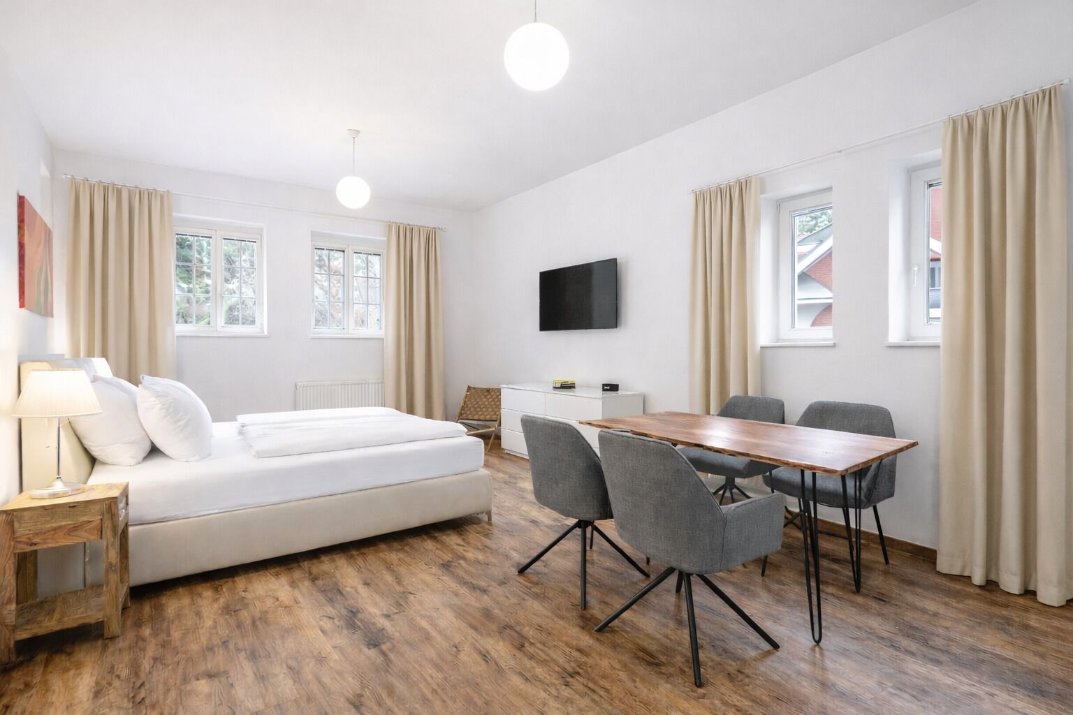 Classic Apartment, 2 Bedrooms | Living area | Flat-screen TV